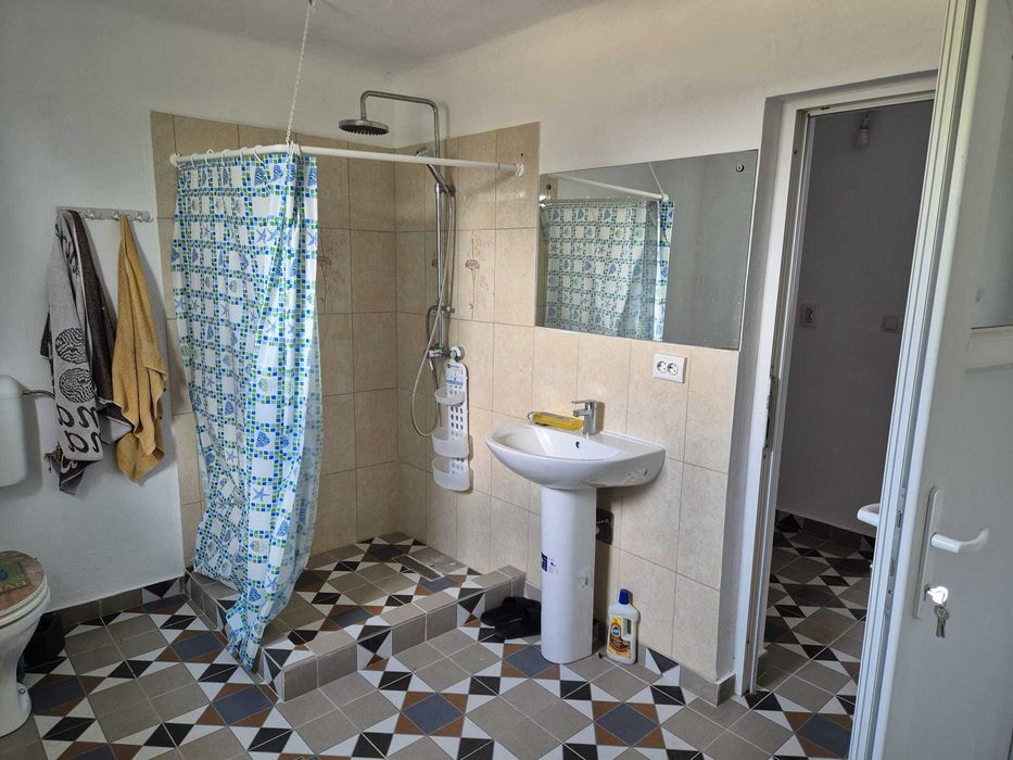 Casa 4 camere + spatiu comercial stradal + teren 1500 mp