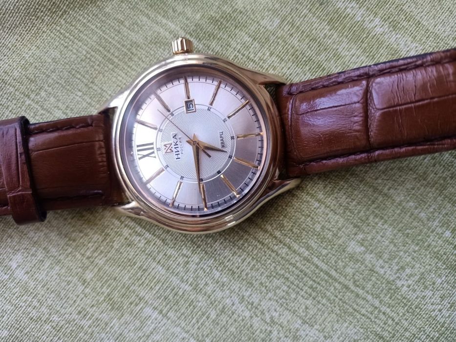 Золотые часы Ника