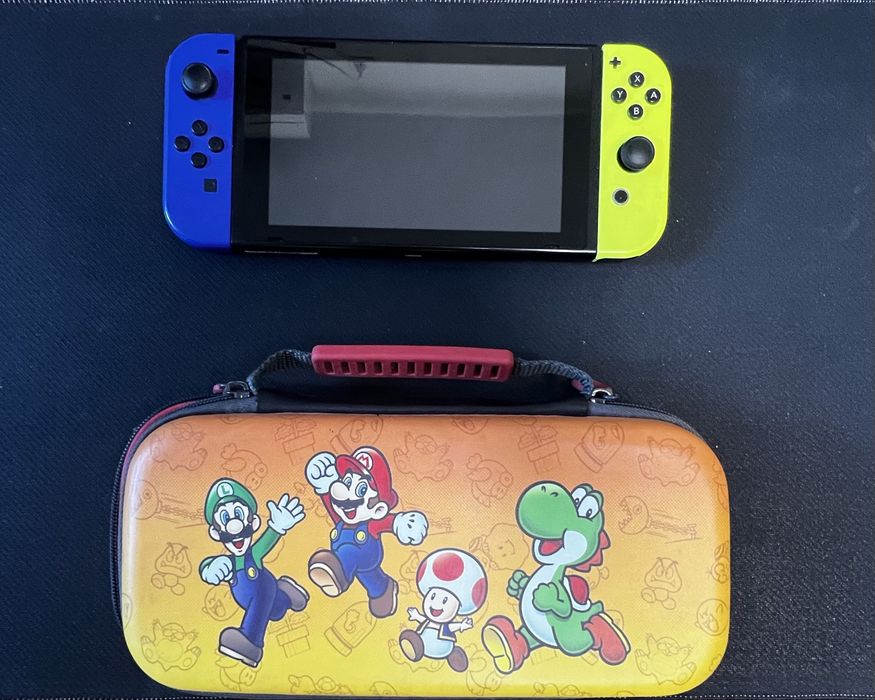 Nintendo Switch V2 (HAC-001(-01)) + 6 игри + 4 Joy-Con + Pro Controller + зарядни станции | ПЪЛЕН КОМПЛЕКТ
