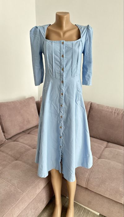 Rochiță super elastică , ca și nouă , peste genunchi