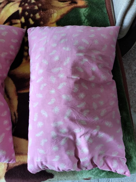 Пуховые подушки.