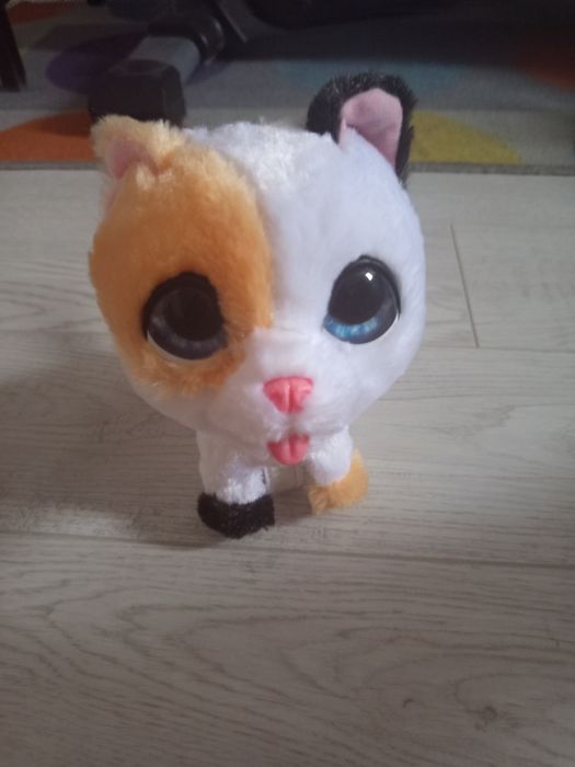 игрушка кошечка на колесиках