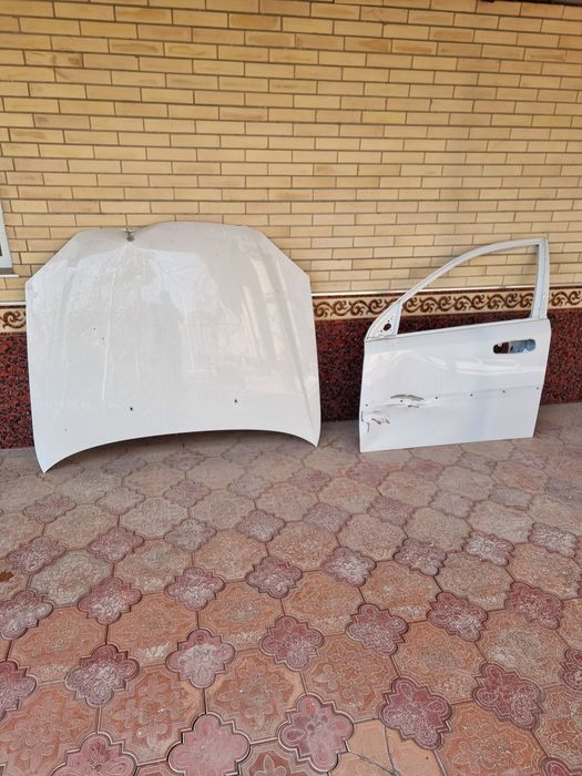 Gentra  eshik kapot oq rang 2022 yil