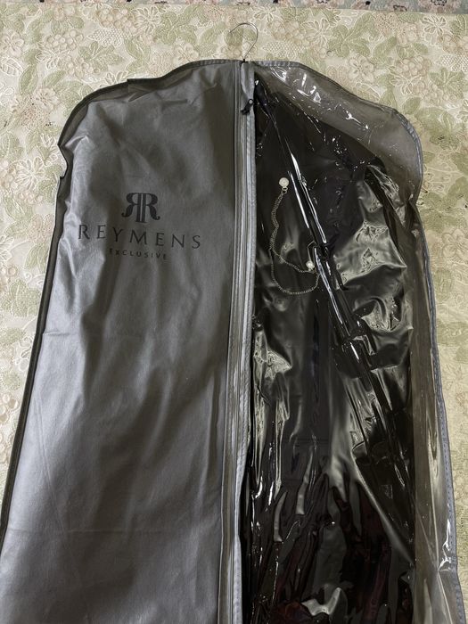 Двубортный костюм тройка