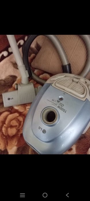 Пылесос LG,серого цвета.