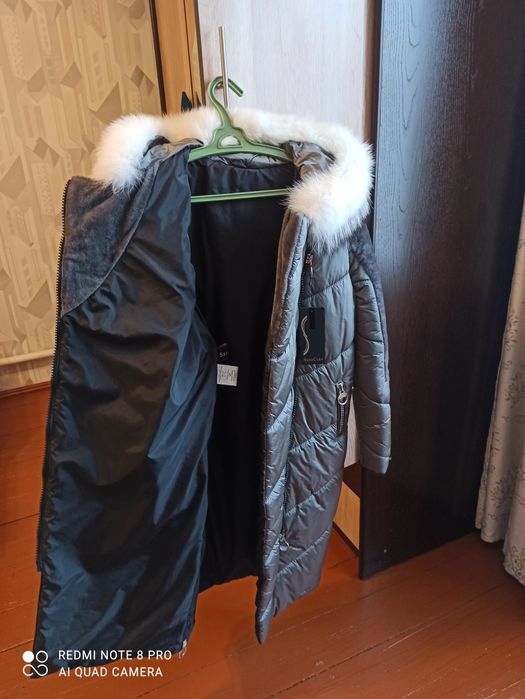 Продам новый пуховик -дубленку.Турция