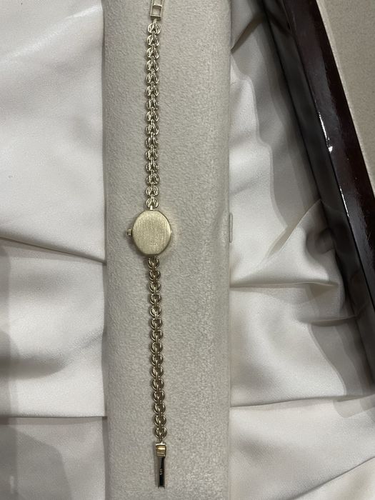 Золотые женские часы