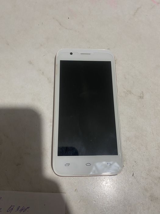 Продам телефон MicroMax Q346