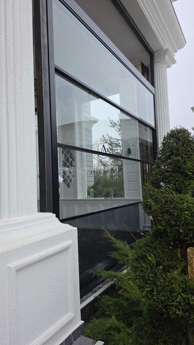 terase inchise cu sticla ghilotina actionata electric