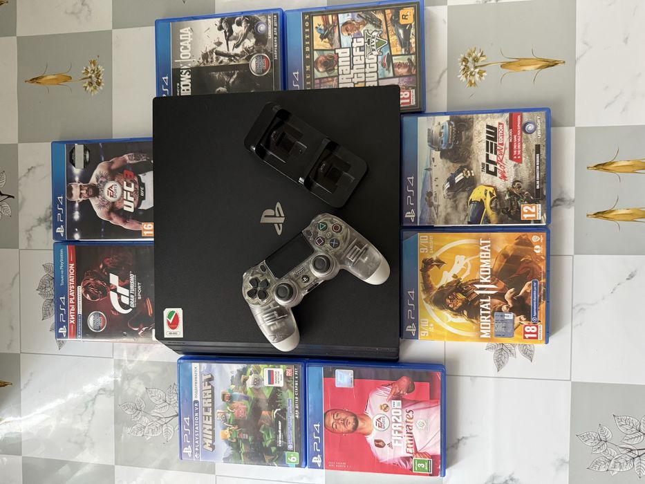 PlayStation 4 Pro 850 ГБ + 8 игр + зарядная станция