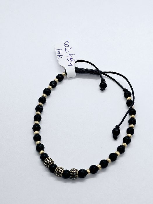Vand bratara snur cu bile din aur 14 k cod 494