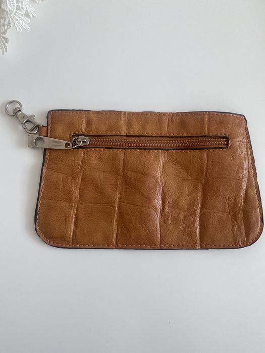 Продам кошелек новый с замочком цвет коричневый мягкий