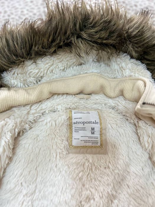 Продаю б/у теплую куртку 46 размера