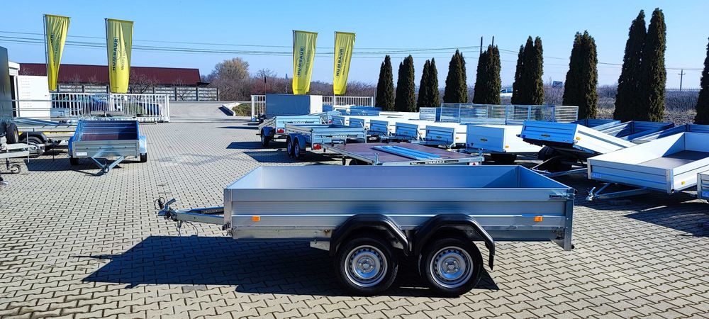 Remorca aluminiu suspensie foi lamelare si amortizoare.