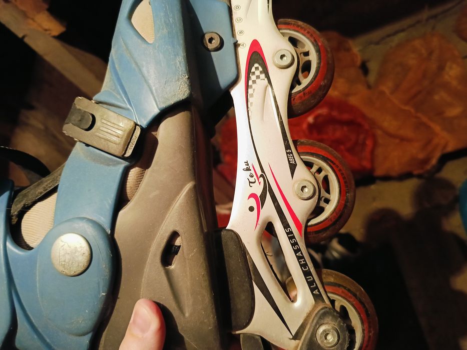 Роликовые коньки