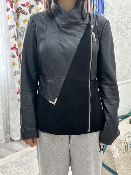 Кожанный педжак .