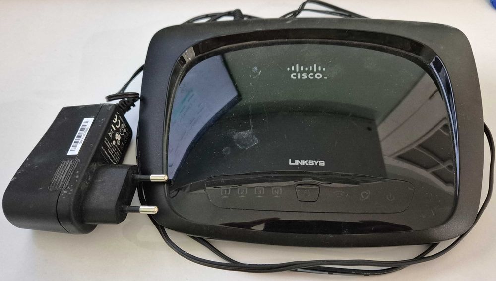 Рутер Linksys WRT120N и Рутер MSI RG300EX Lite