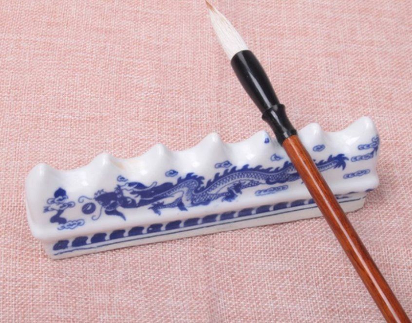 Интересные фарфоровые подставки для ручек кисточек.
длина 15см
высот