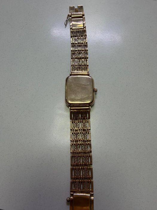 Золотые часы МакТайм