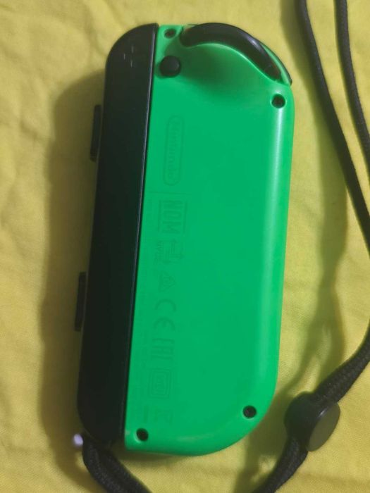 Set controllere originale Nintendo Switch Joy-Con Neon Green / Neon Red