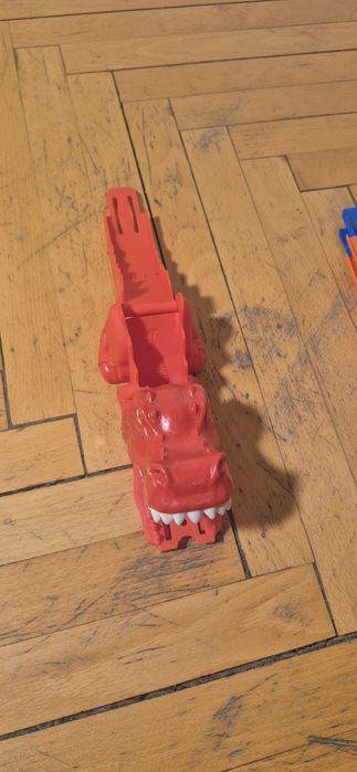 Lansator Hot Wheels DINO – Lansare prin Coadă (Gravitational)