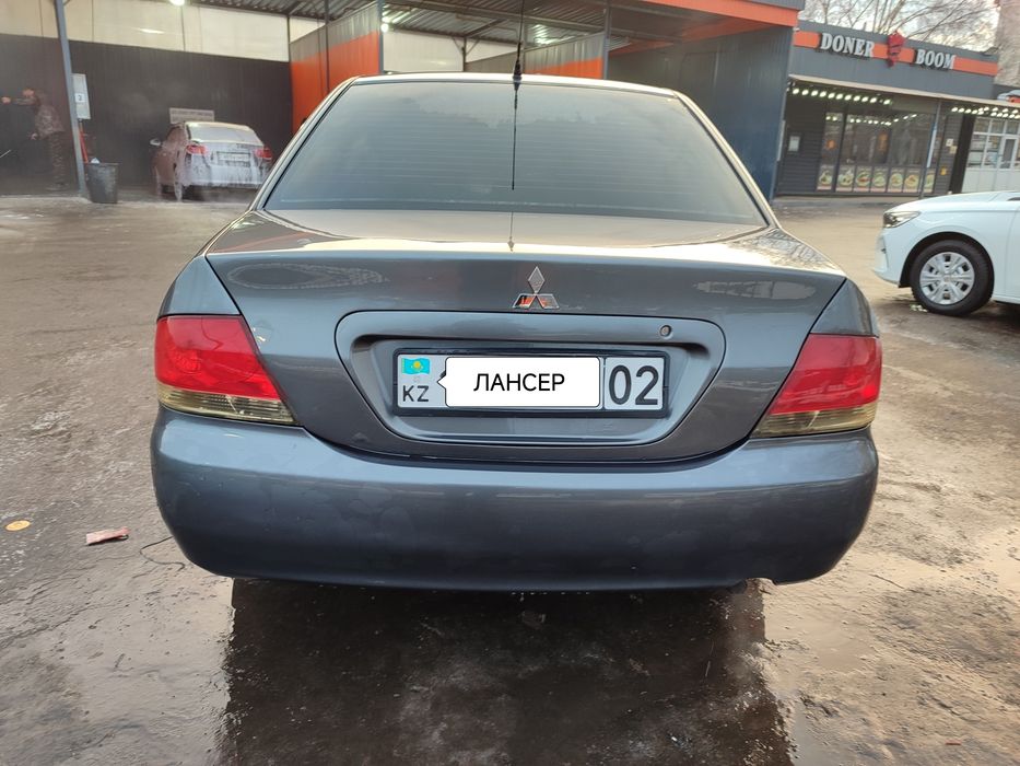 Митсубиси Лансер