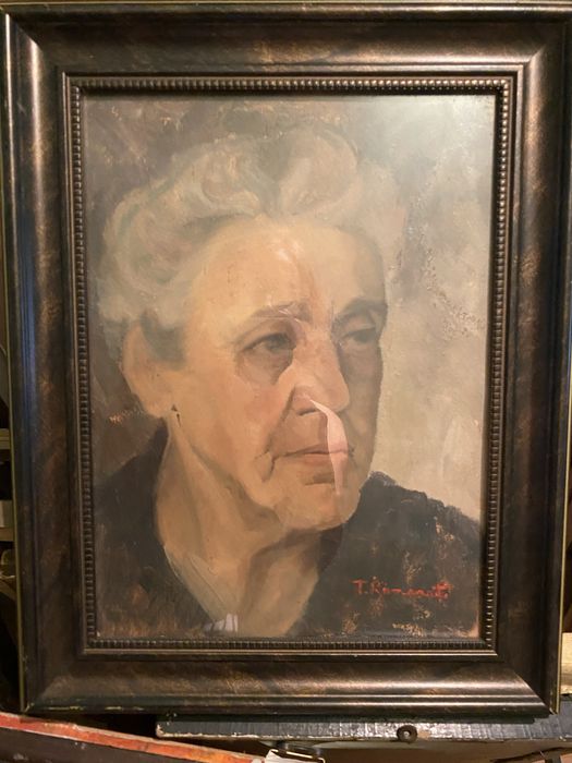 Portret de femeie, semnat T. Romanati, ulei pe carton 25x33 cm