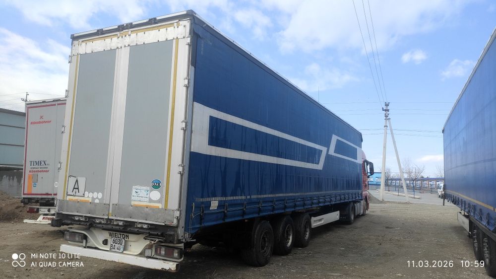 2015 й. мега прицеп сотилади. холати аъло. дамкратлик. том тенти янги