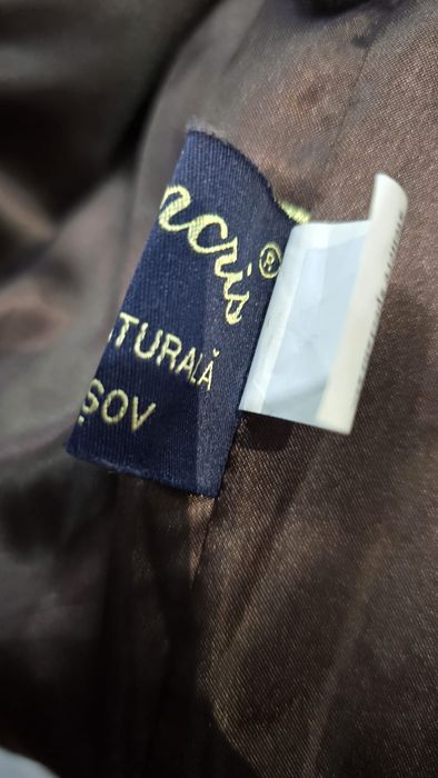 Vestă și haină de blană
