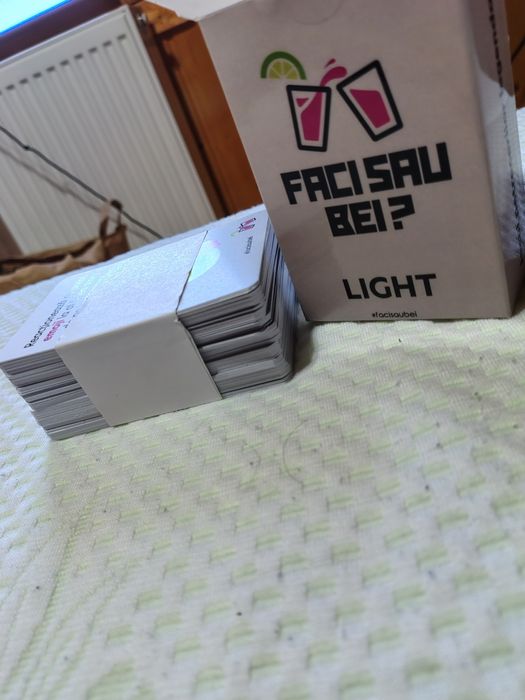 Joc de petrecere "Faci Sau Bei"