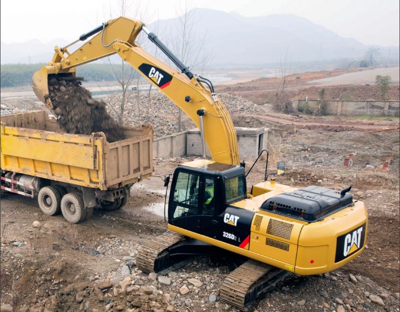 Экскаватор с гидромолотом. Гидромолот CAT B30