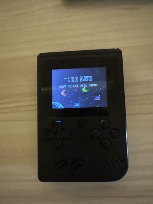 Преносима конзола videogame с дистанционно и 400 игри за 2 играчи, в черен цвят, 7.5x2x11.5 см