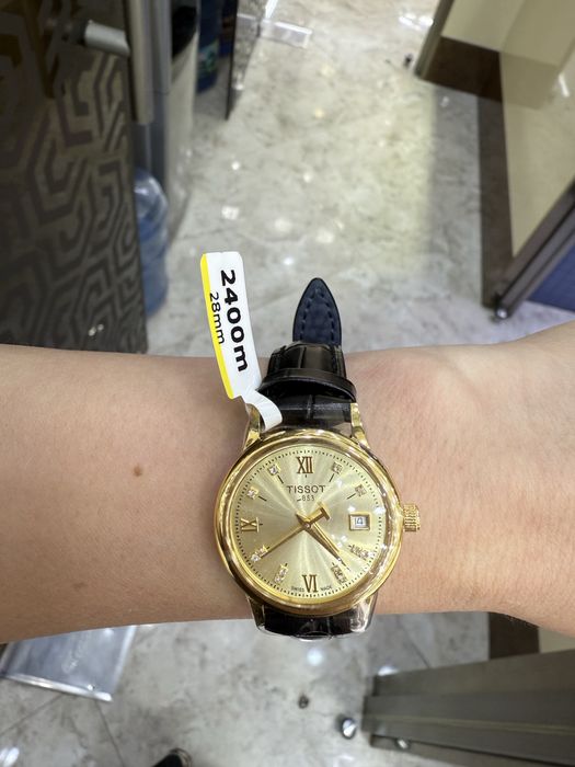 Золотые часы Tissot