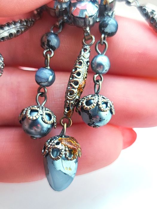 Винтажная брошь крупная под серебро.