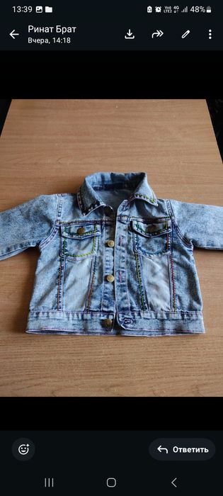 Продам зимние комбинезоны .