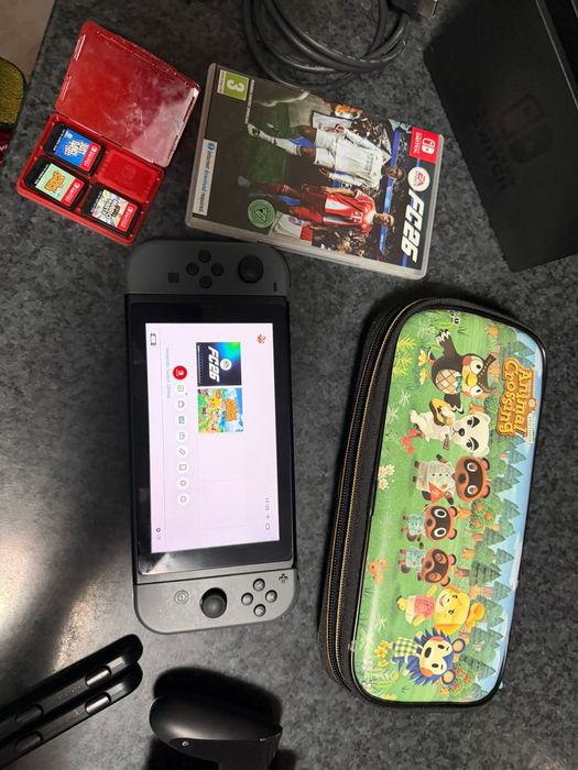 Nintendo Switch  + 4 jocuri FULL BOX