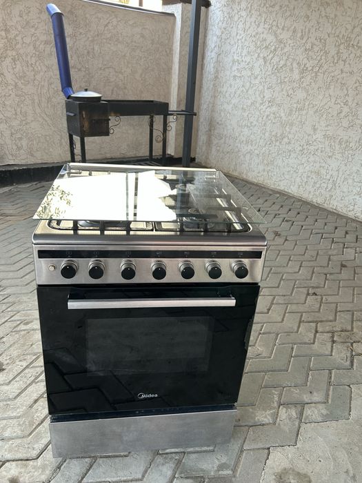 Газплита с эл. духовкой Midea