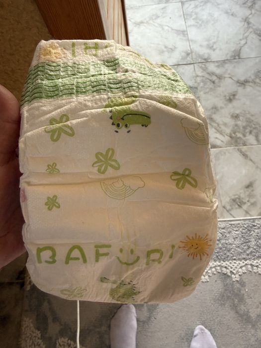 Продам подгузники штук 22.