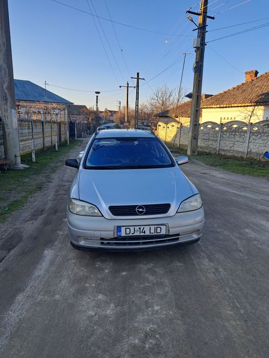 Vand masina opel astra