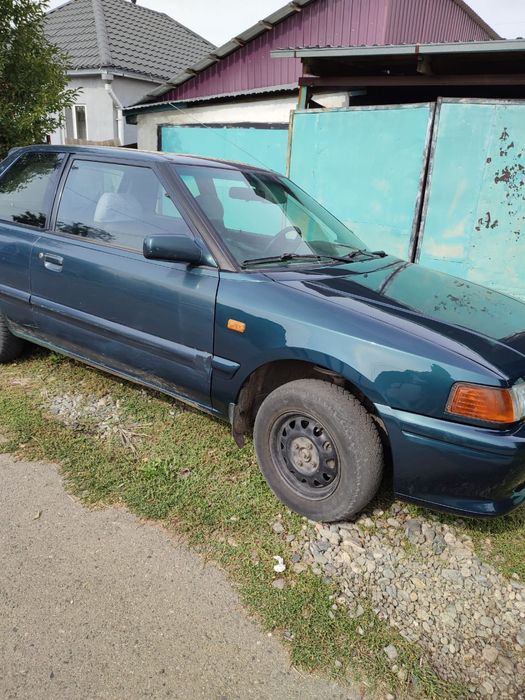 Мазда 323 фамилия