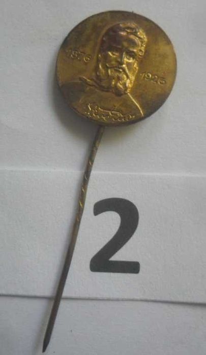 Княжевски двустранен позлатен медал и четири значки над 100 години