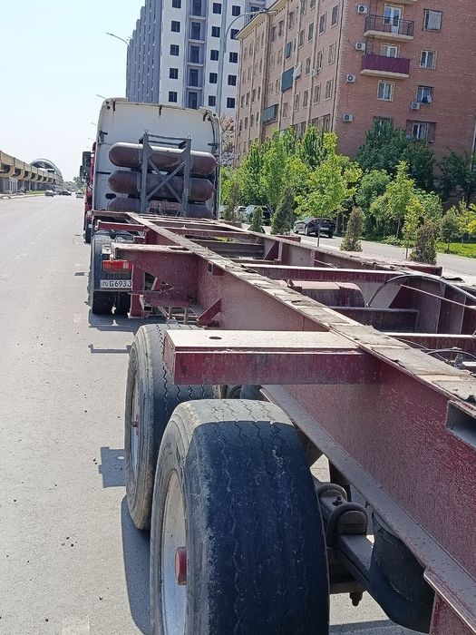 HOWO A6 + Контейнеровоз прицеп Сотилади