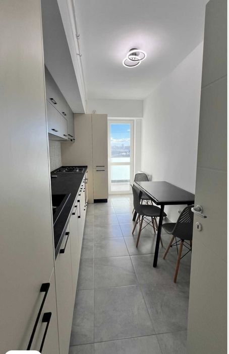 Inchiriez apartament in iasi  cu 2 camere decomandate 60mp complet mobilat  in zona Lidl Pacurari in bloc nou  Conest Evolution loc de parcare inclus