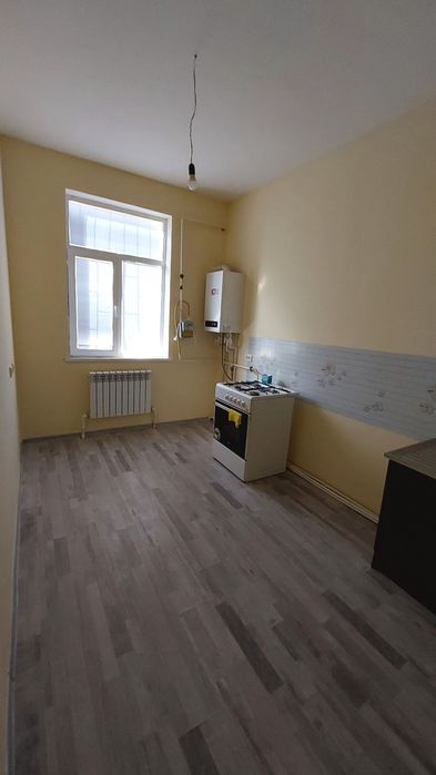 Panayev balalar baqshasi qasindagi 3 etajli dom 1-etaj magazinli