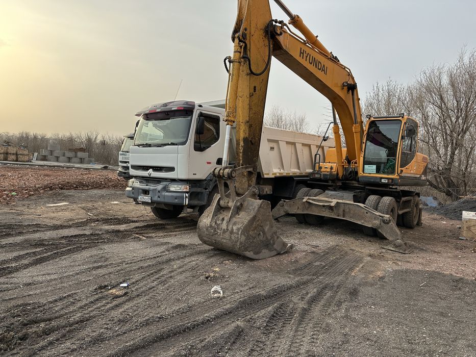 Экскаватор Услуги apенда кoлёcного экскаватoрa