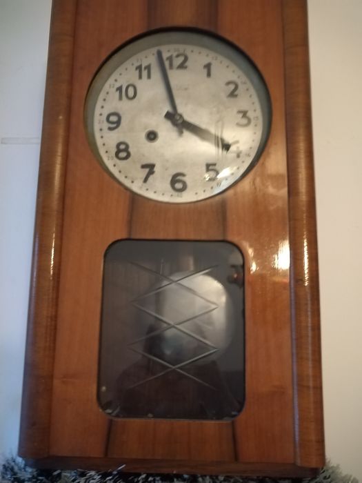 Ceas de perete vintage cu pendul marca Metron