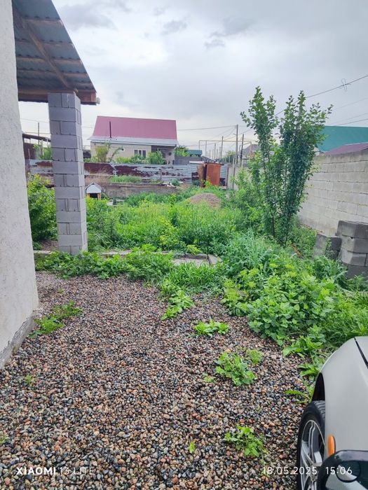 Участок с домом (времянка)