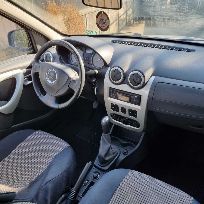 Dacia Logan 1.6 benzina 16v an 2012