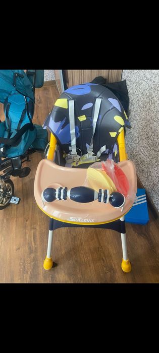 Детский велосипед и сведения стул