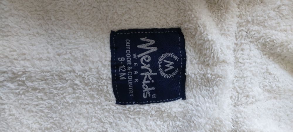 Отдам детские комбезы